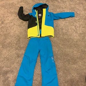 Blue black, and yellow snowboarding suit